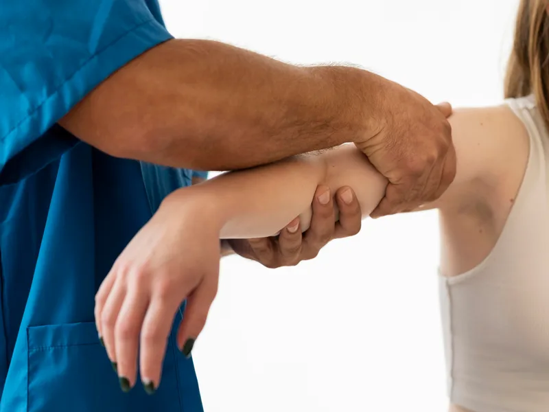Chiropractic care for elbow pain at Heights Chiropractic Center in Houston